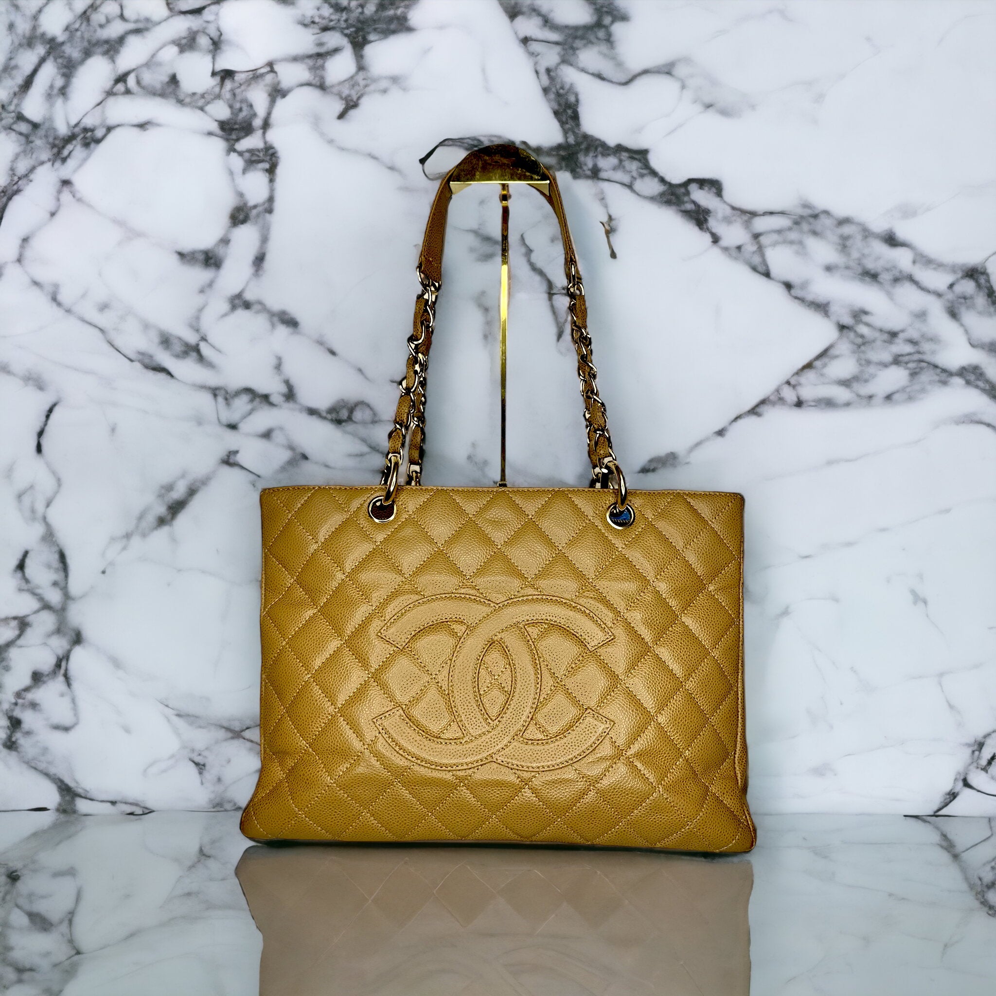 Chanel Grand Shopping tote in beige caviar gold hardware